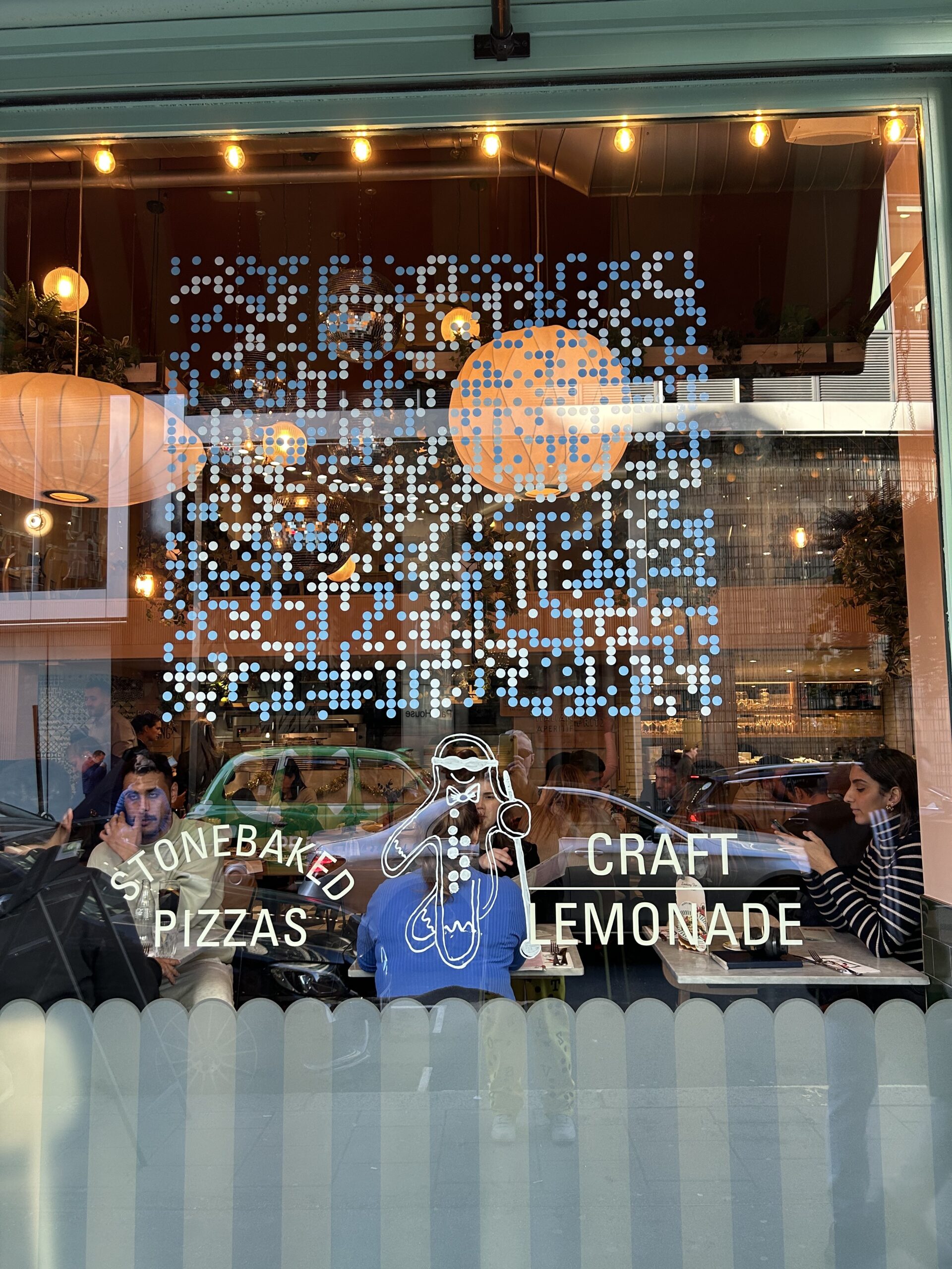 A big section of braille text on a glass window